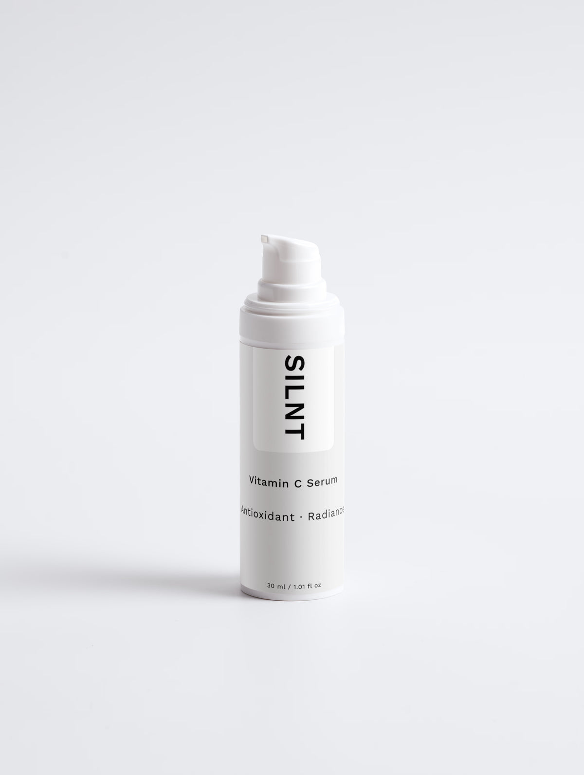 SILNT Vitamin C Serum bottle on light grey background