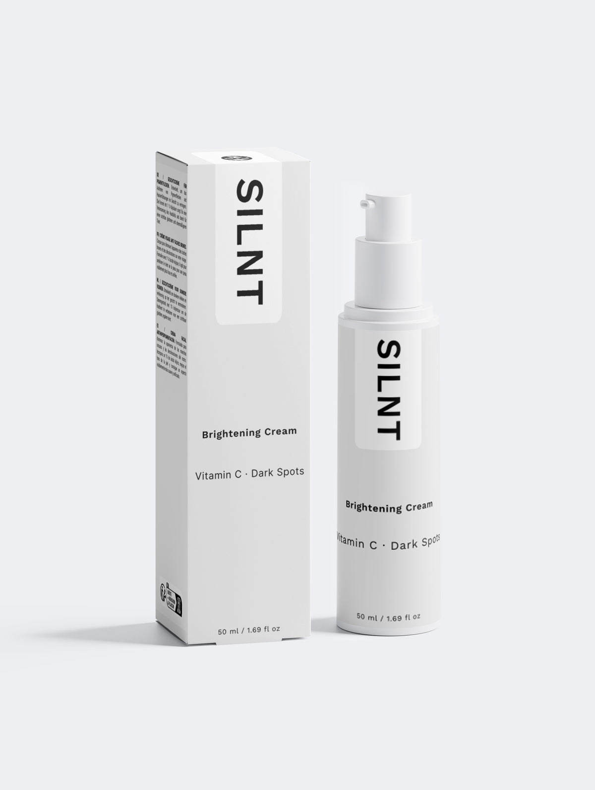 SILNT Brightening Cream carton box standing next to the pump bottle on a light background