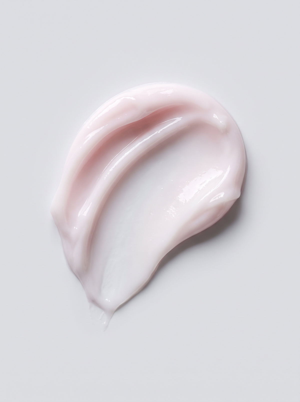 SILNT Retinol Alternative Cream pale pink cream swatch with a glossy finish on a light grey background