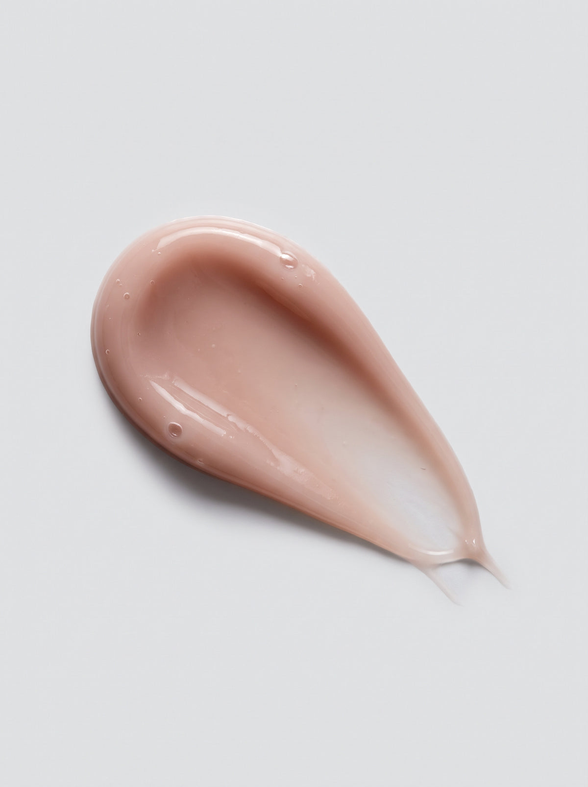 SILNT Peptide Serum nude-pink teardrop swatch on a light grey background