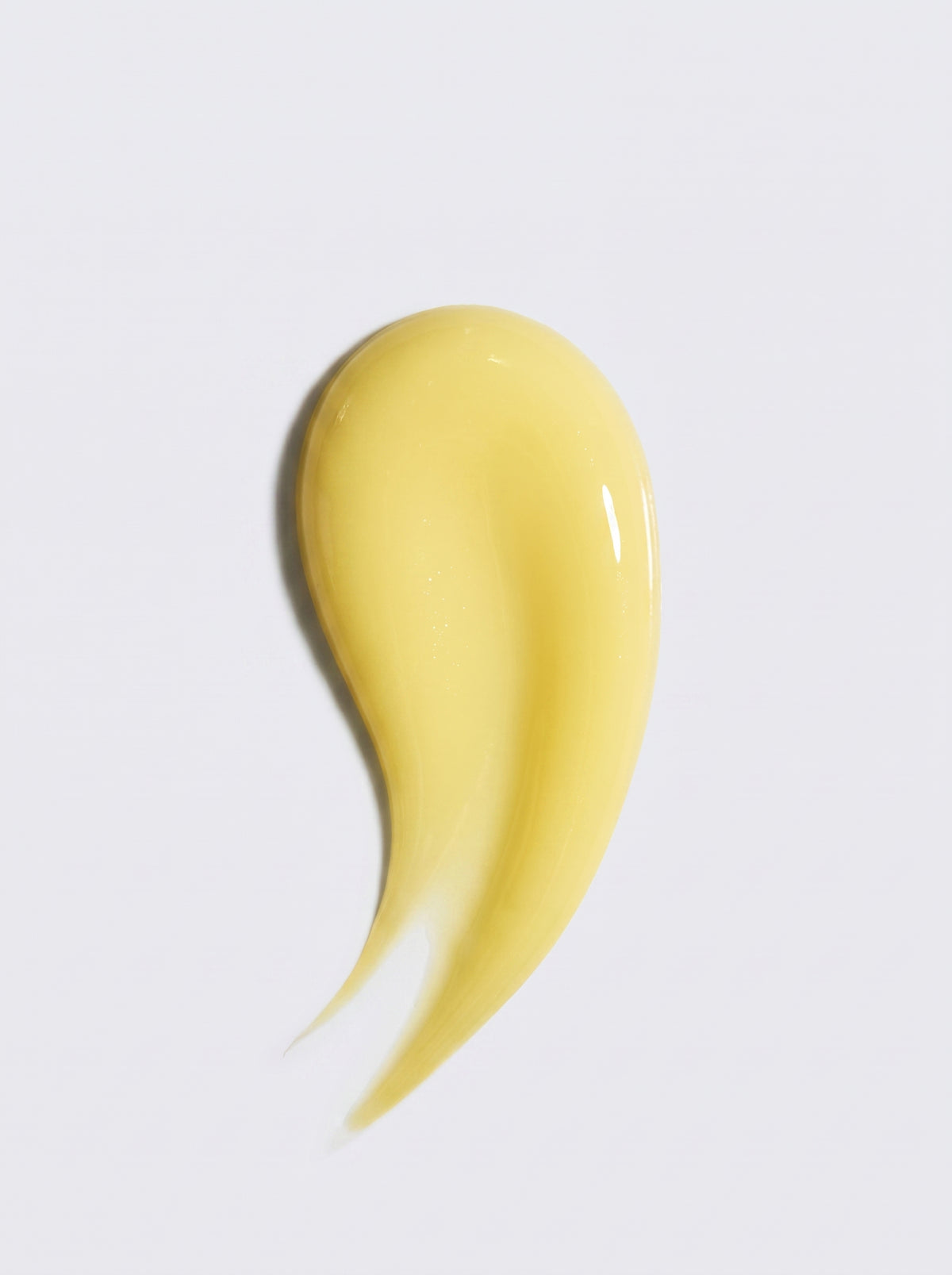Pale yellow Vitamin C serum texture swatch