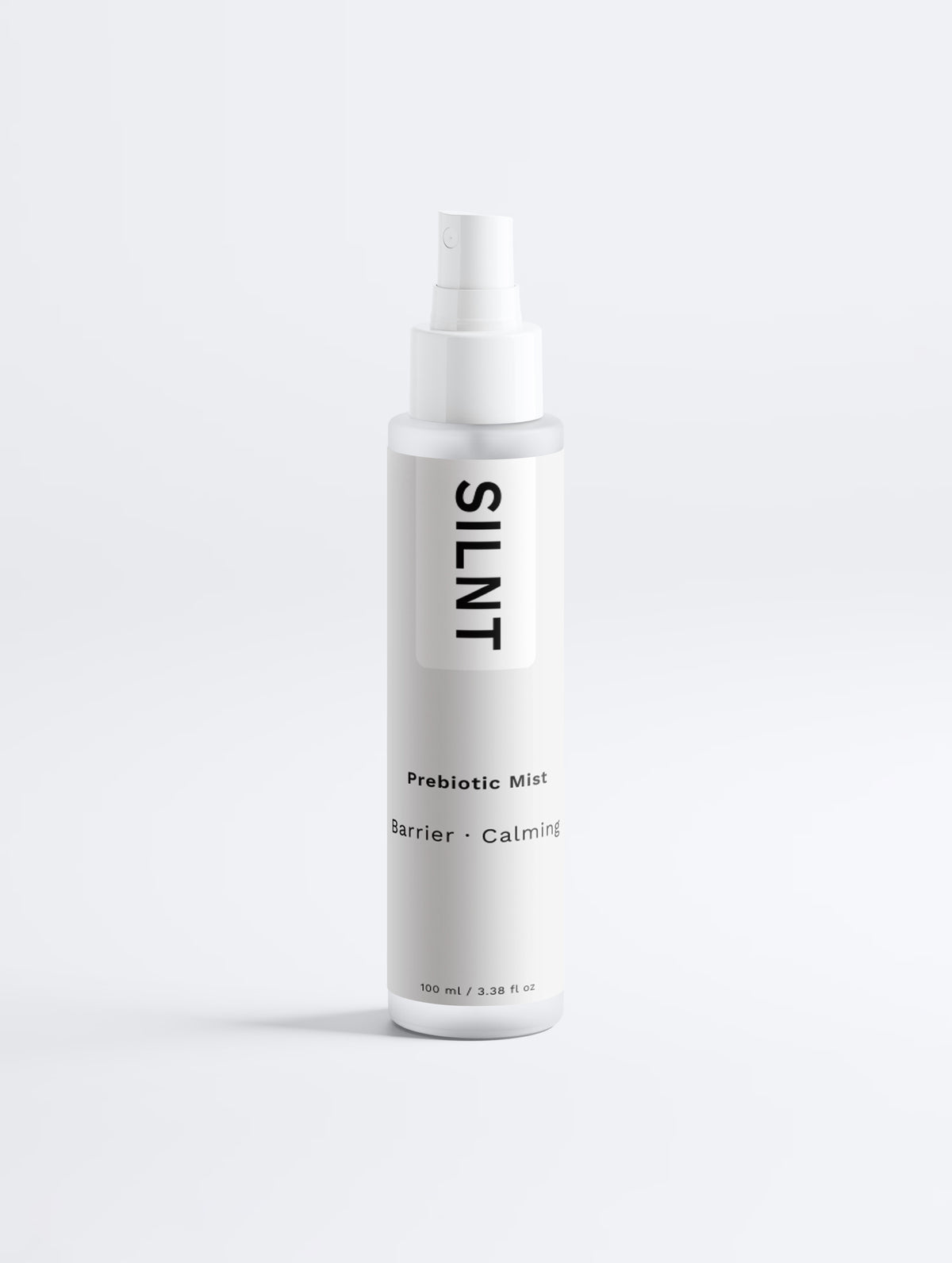SILNT Prebiotic Mist spray bottle standing on a light minimalist background