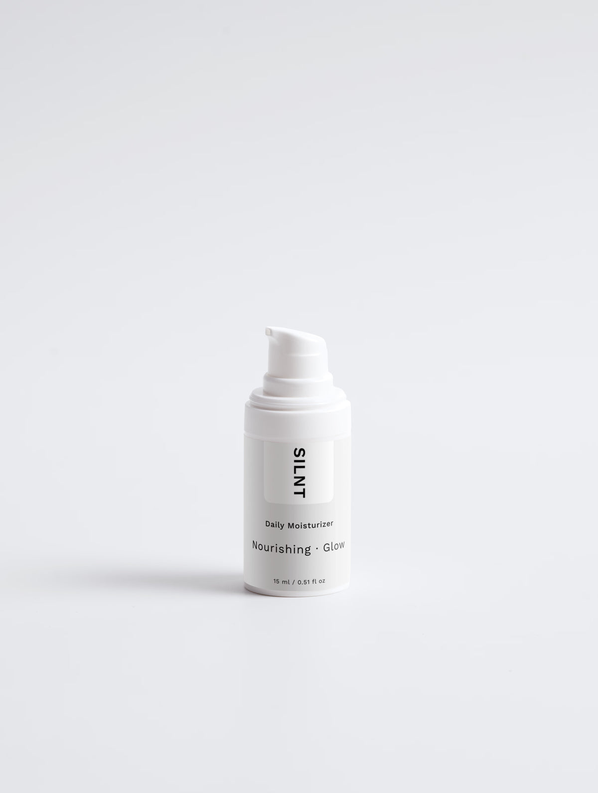 SILNT Daily Moisturizer 15 ml pump bottle on a light grey background