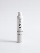 SILNT Day Cream 50 ml white pump bottle on a light grey background