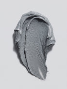 SILNT Clarifying Mask grey clay swatch with a matte finish on a light grey background