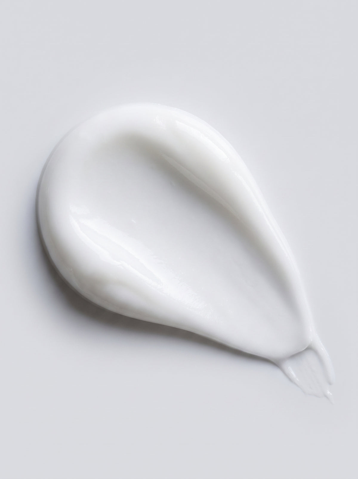 SILNT Rich Cream thick white cream swatch with a satin finish on a light grey background