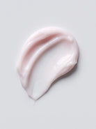 SILNT Retinol Alternative Cream pale pink cream swatch with a glossy finish on a light grey background