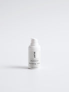 SILNT Daily Moisturizer travel size white pump bottle on a light grey background