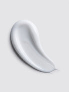 SILNT Daily Moisturizer white cream swatch with a satin finish on a light grey background
