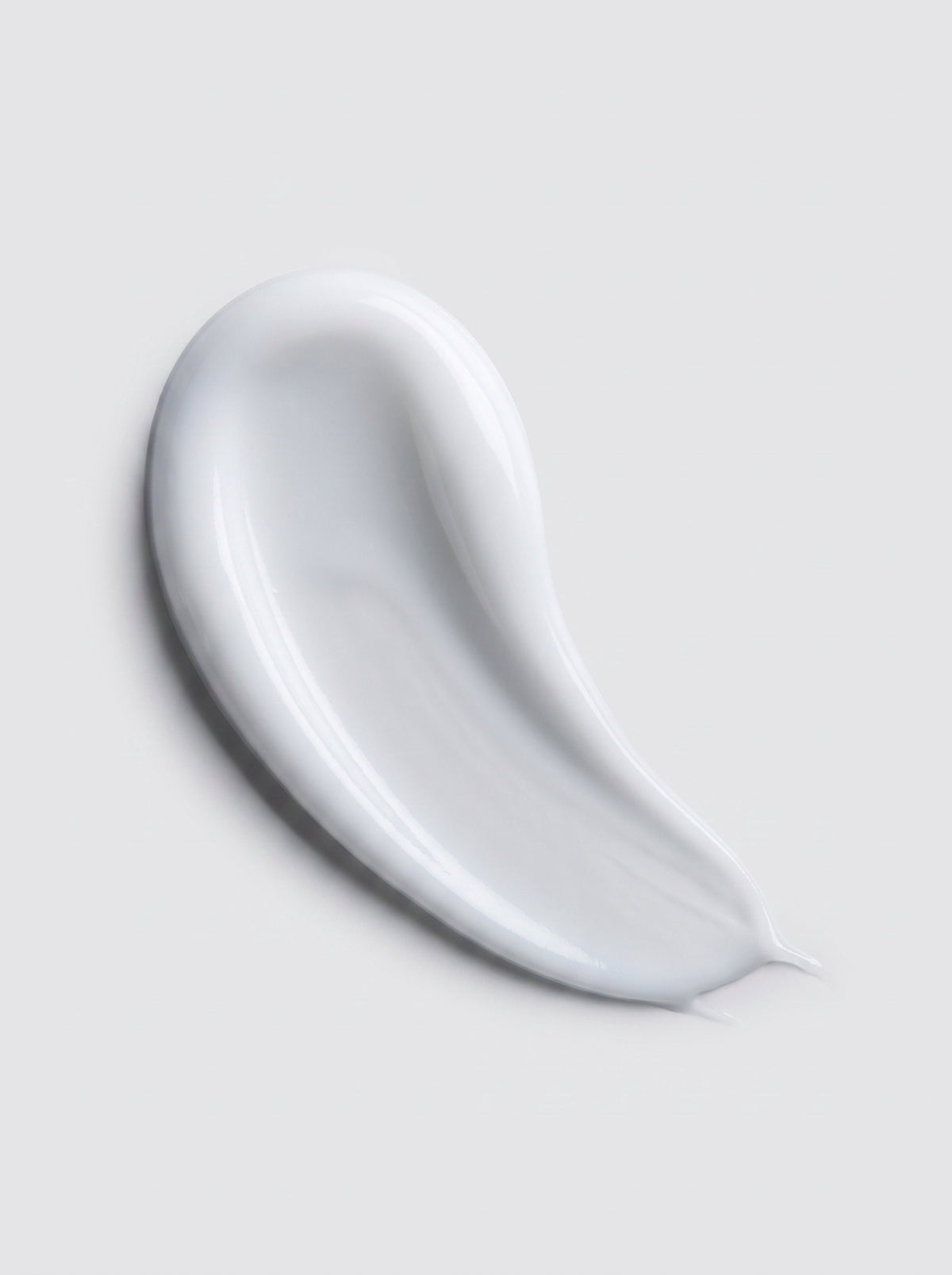 SILNT Daily Moisturizer white cream swatch with a satin finish on a light grey background