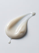 SILNT Brightening Serum ivory swatch with a glossy finish on a light grey background
