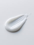 SILNT Plumping Serum milky white swatch with a glossy finish on a light grey background