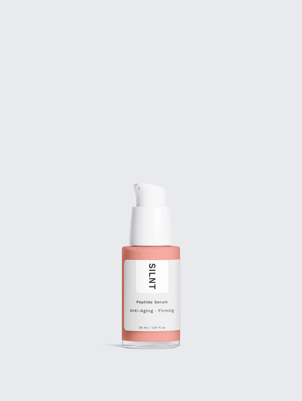 SILNT Peptide Serum bottle with a coral label on a light grey background