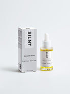 SILNT Bakuchiol Serum bottle standing beside its carton on a light grey background