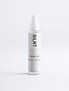 SILNT Prebiotic Mist spray bottle standing on a light minimalist background