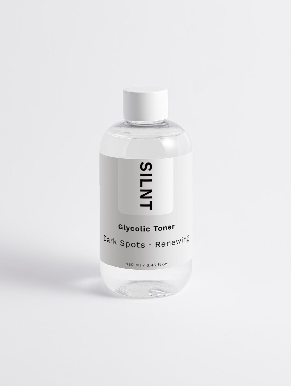 SILNT Glycolic Toner bottle standing on a light minimalist background