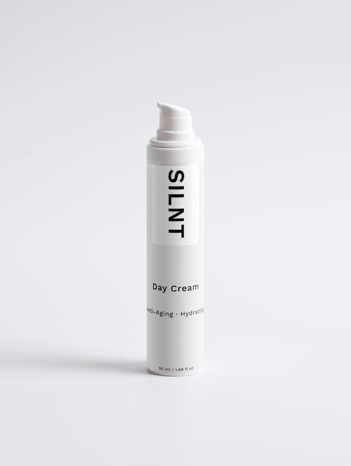 SILNT Day Cream white pump bottle on a light grey background