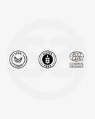 Certification badges for SILNT Facial Oil: 100% vegan, gluten free and Ecocert COSMOS Organic