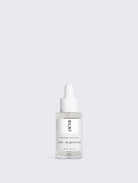 SILNT Exfoliating Concentrate glass dropper bottle with clear fluid on a light grey background